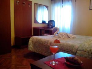 Postel nebo postele na pokoji v ubytování Hotel Monte Fior