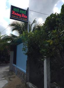 a sign for an indian restaurant next to a fence at HÒANG HÔN HOMESTAY in Ben Tre +28 photos