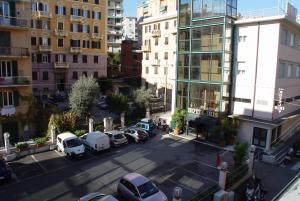 an aerial view of a parking lot in a city at Hotel Iris in Genoa