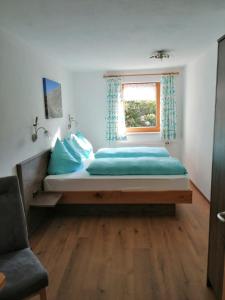 Postel nebo postele na pokoji v ubytování Haus Romantik