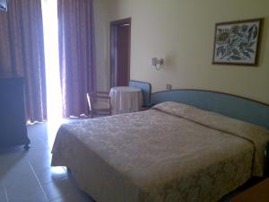Hotel Parco degli Ulivi客房内的一张或多张床位