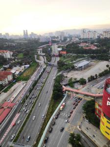 an aerial view of a busy city with traffic at Villa Putra PWTC R3 Single Room in Kuala Lumpur