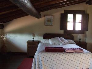 Postel nebo postele na pokoji v ubytování Casas rurales Caño Chico y La Fuente