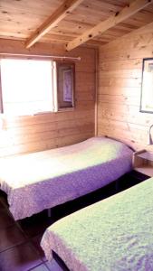 Katil atau katil-katil dalam bilik di Camping Aín Jaca