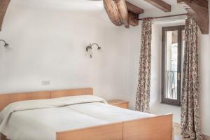 Voodi või voodid majutusasutuse Albergo Bellavista toas