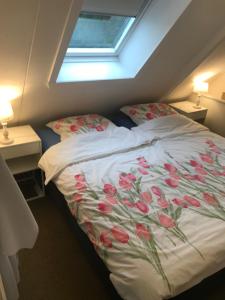 Postel nebo postele na pokoji v ubytování B&B De Duinhoek