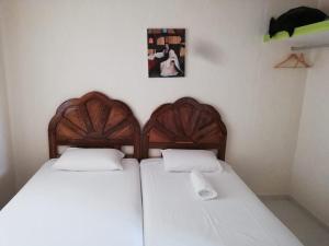 Krevet ili kreveti u jedinici u objektu Joyas de Ixtapa... ¡El confort de tu Casa Ideal!