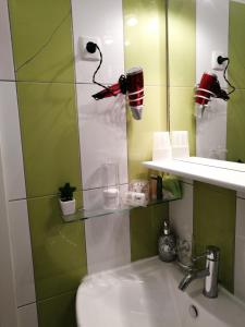 Koupelna v ubytování Apartmani Paula