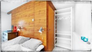 Ένα ή περισσότερα κρεβάτια σε δωμάτιο στο Bergvegen Guesthouse Aalesund