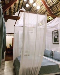 Кровать или кровати в номере Green Organic Villas