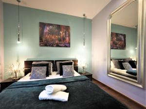 Posteľ alebo postele v izbe v ubytovaní VIP Apartamenty Gorące Źródła