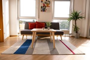Posezení v ubytování FULL HOUSE Studios - KornhausPremium Apartment - Balkon, WiFi