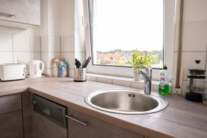 Kuchyň nebo kuchyňský kout v ubytování FULL HOUSE Studios - KornhausPremium Apartment - Balkon, WiFi + 37 fotografií