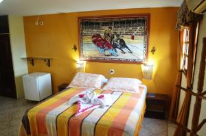 Postel nebo postele na pokoji v ubytování Hotel Pousada Viking