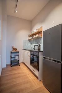 Kuchyň nebo kuchyňský kout v ubytování Apartments Leopold Ferdinand