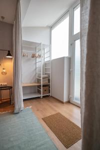 Postel nebo postele na pokoji v ubytování Apartments Leopold Ferdinand