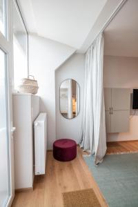 TV a/nebo společenská místnost v ubytování Apartments Leopold Ferdinand