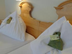 Postel nebo postele na pokoji v ubytování Gasthof Unterberger