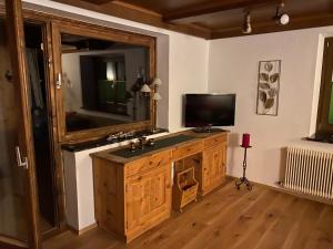 TV a/nebo společenská místnost v ubytování Appartments-Hutter