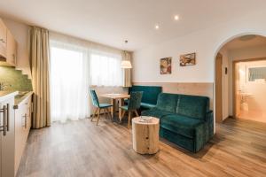 Posezení v ubytování Hotel & Residence Rebhof