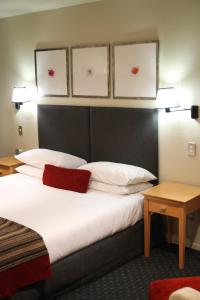 Postel nebo postele na pokoji v ubytování Bentleys Motor Inn