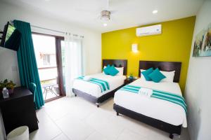 Postel nebo postele na pokoji v ubytování Asilé Hotel Boutique
