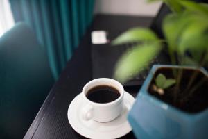 Příslušenství pro přípravu čaje a kávy v ubytování Asilé Hotel Boutique