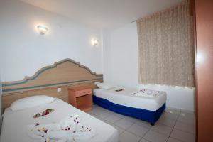 Cama o camas de una habitación en Camyuva Motel