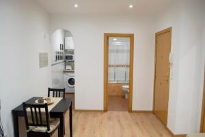 Kuchyň nebo kuchyňský kout v ubytování Apartamenticos Boggiero IV