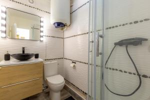 a bathroom with a toilet and a sink and a shower at Little Bali - COSY-VUE MER - PLAGE - HOST PROVENCE in La Seyne-sur-Mer