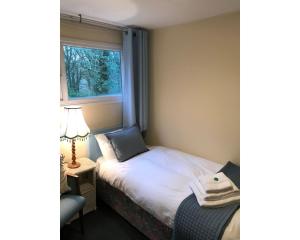 Postel nebo postele na pokoji v ubytování Villa 7 Lanteglos, Camelford, Cornwall