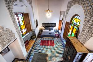 Postel nebo postele na pokoji v ubytování Palais Riad Chahd Luxury
