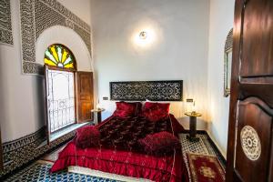 Postel nebo postele na pokoji v ubytování Palais Riad Chahd Luxury
