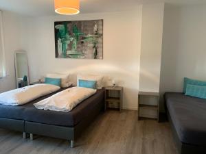 Postel nebo postele na pokoji v ubytování Hotel Hegemann garni