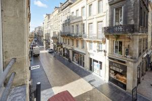 a view of a city street with buildings at Quality Hotel Bordeaux Centre in Bordeaux