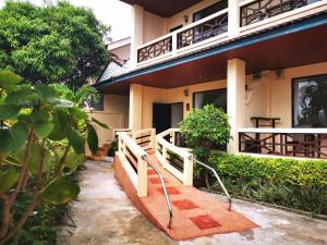 a building with a walkway in front of it at Aumpai Luxury in Lamai