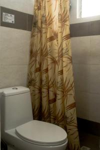 Ванная комната в Isla Gecko Resort