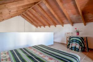 Postel nebo postele na pokoji v ubytování Casa Miguelin