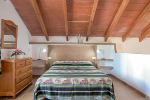 Postel nebo postele na pokoji v ubytování Casa Miguelin