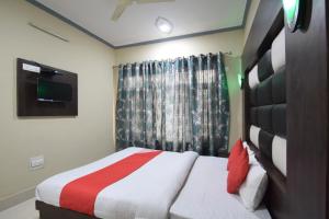 Ένα ή περισσότερα κρεβάτια σε δωμάτιο στο Hotel Samar