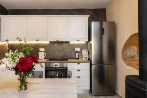 A kitchen or kitchenette at Carya Residence