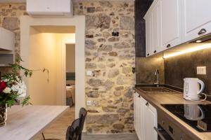 A kitchen or kitchenette at Carya Residence