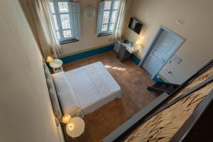 Posteľ alebo postele v izbe v ubytovaní Aquae Sinis Albergo Diffuso