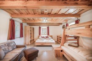 Postel nebo postele na pokoji v ubytování Ferienhaus Spitzenhof - Urlaub am Bauernhof