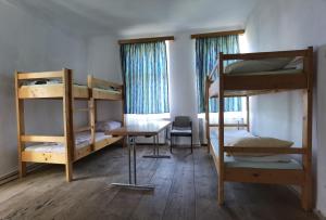 Postel nebo postele na pokoji v ubytování Kinderuni Bekokten