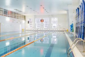a large swimming pool with water in it at Vozdvizhenskoe Park Hotel in Serpukhov
