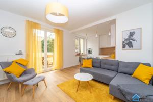 Posedenie v ubytovaní Tradycyjny Apartament 3city w Gdyni z Parkingiem by Noclegi Renters