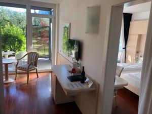 Postel nebo postele na pokoji v ubytování Park Hotel Il Vigneto