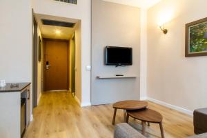 TV a/nebo společenská místnost v ubytování Spa Hotel Colossae Thermal