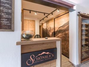 a seafood shop with a sign on the wall at Anja's Schönblick - Bed & Breakfast in Gerlos